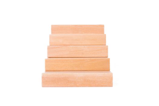 Business concept, blocks of wood as stairs, isolated on white background.