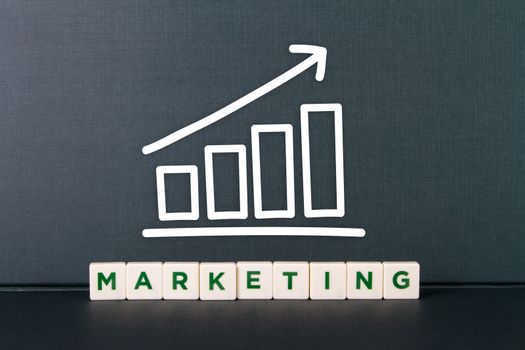 Marketing word in letters with bar chart of growth.