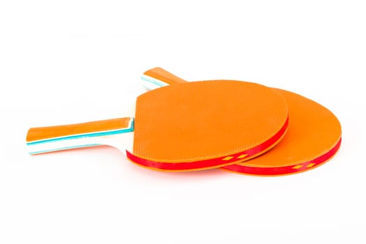 Two rackets for playing table tennis, isolated on white background.