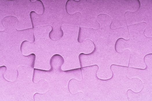Pink complete puzzle pieces.
