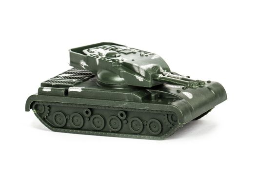 Miniature toy tank, isolated on white background.