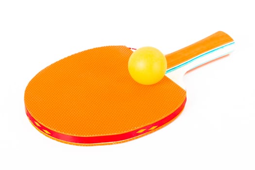 Single, orange table tennis racket with ball, isolated on white background.