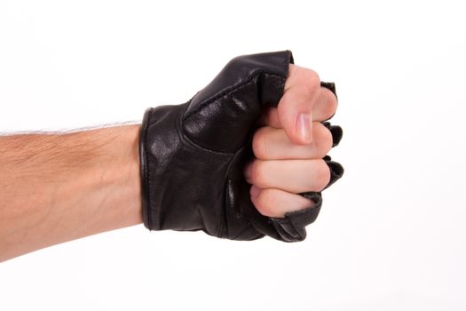 Fist, punch coming out from side with sport glove, isolated on white background.
