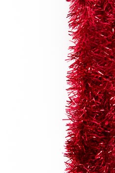 Red xmas ornament as border, isolated on white background.