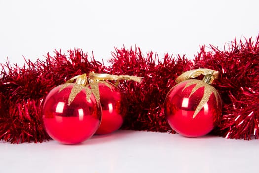 Christmas ornaments and red balls, isolated on white background.