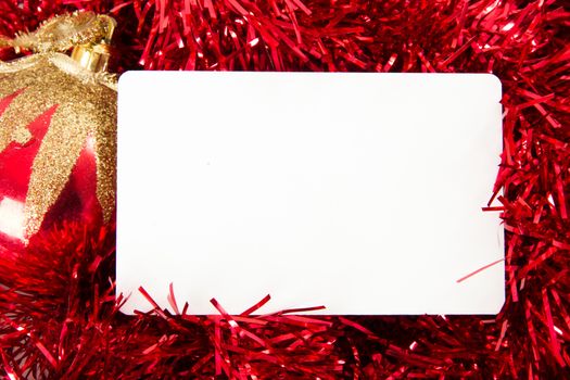 Blank white greeting card for your message on christmas ornaments