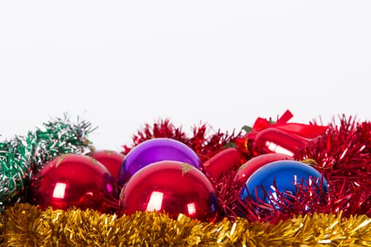 Christmas ornaments, balls, bells with space on top, isolated on white background.
