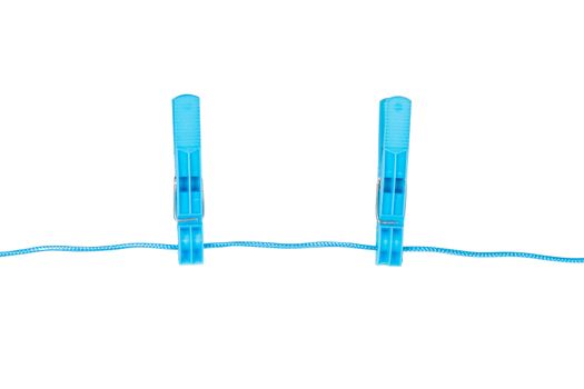 Couple of blue, plastic clothespin, isolated on white background.