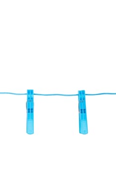 Couple of blue, plastic clothespin with copyspace, isolated on white background.