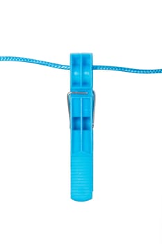 Single, blue, plastic clothespin on rope, isolated on white background.