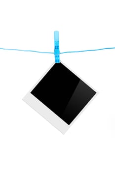 Single, black, blank photo frames on rope, isolated on white background.