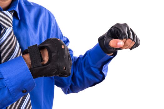 Businessman in sport gloves on white background.