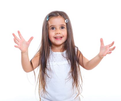 Beautiful little girl with hands up happy smiling in studio. Isolated white background