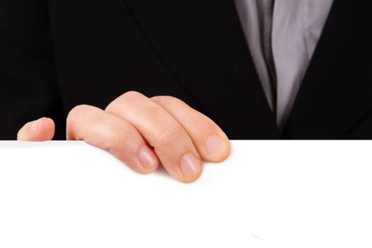 Business woman hand holding and showing white, empty poster, paper sign for your message, isolated on white background.