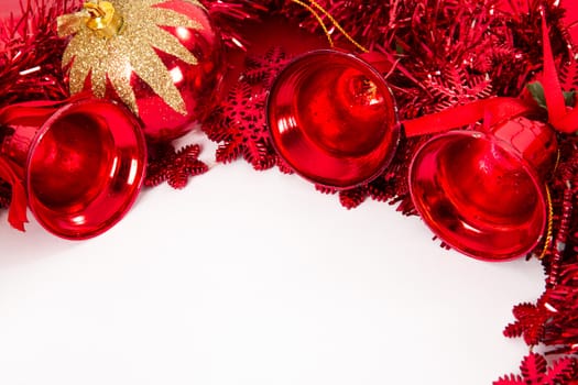 Christmas ornaments, balls, bells and stars with space, isolated on white background.