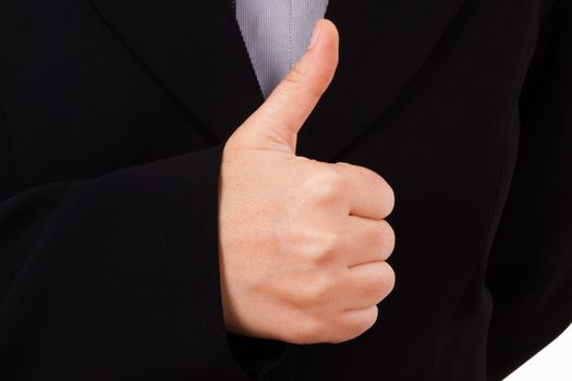 Business woman in dark suit with hand thumb up sign.