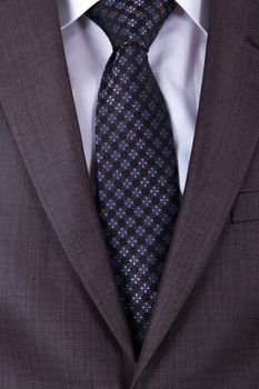 Smart businessman with tie and jacket.