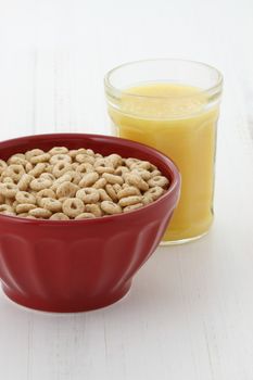 Delicious and nutritious lightly toasted honey, nuts and oats cereal with orange juice.