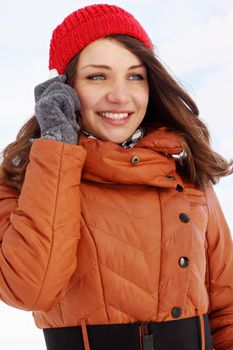 woman talking on the phone in the winter