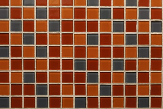 Detail of color pattern and texture of bathroom ceramic tile wall.