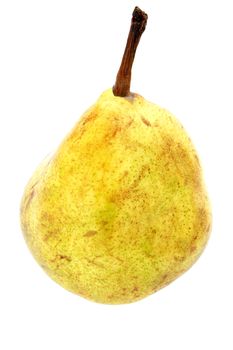 Yellow, spotted pear by closeup against the white background