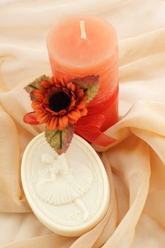 Soap with the image of ballerina and candle with the flower