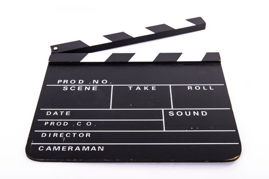Front view of blank black cinema clapper board, isolated on white background.