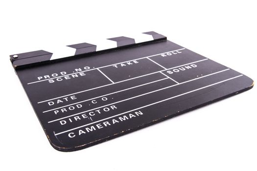 Blank old black cinema clapper board, isolated on white background.