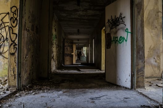 Long corridor in an old abandoned building