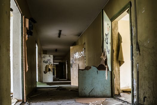 Long corridor in an old abandoned building