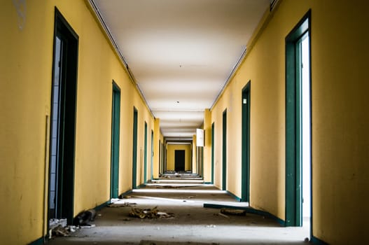 Long corridor in an old abandoned building