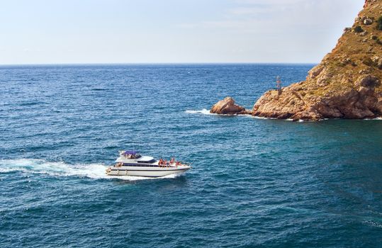 fast motor boat floating on the waves