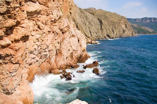 Sea waves lapping on the rocks