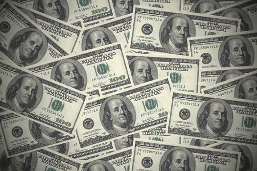 One hundred dollar bills background, lots of money.