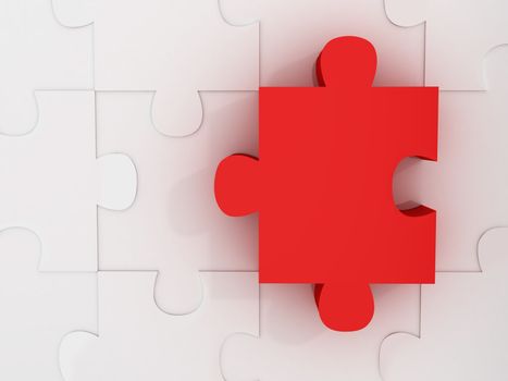 Red jigsaw puzzle piece standing out with its dimension.