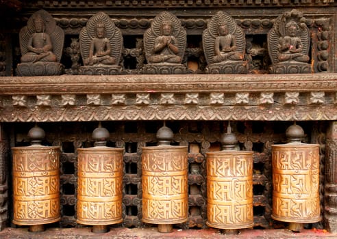 Prayer wheels at swayambhunath monkey temple in Kathmandu, Nepal                              