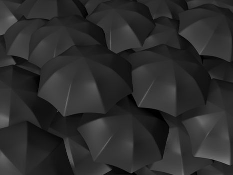 Group of black open umbrellas.