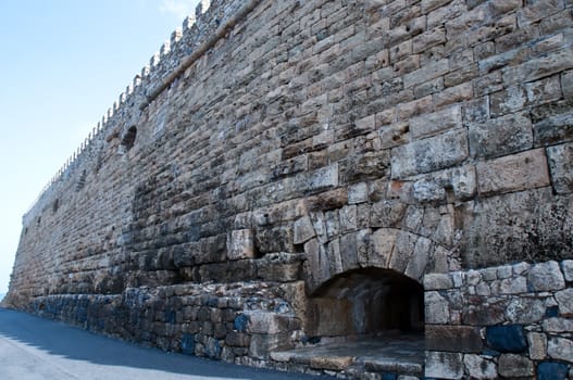 The wall of an ancient fortress .