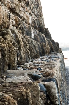 The wall of an ancient fortress .