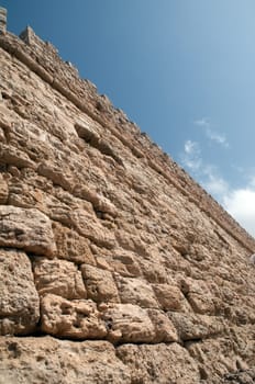 The wall of an ancient fortress .
