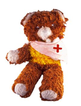 Broken armed Teddy bear isolated over white background