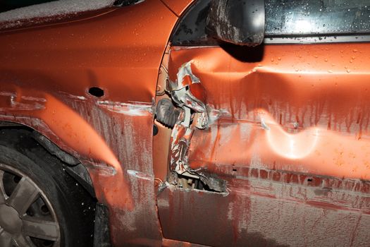 Car accident in the dark on a snowy road