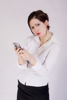portrait of young business woman holding cell phone