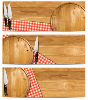 Cooking banners with round cutting board, red checked tablecloth on wooden table and kitchen knife isolated on white

