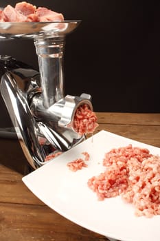 Meat grinder from above, preparation of forcemeat 