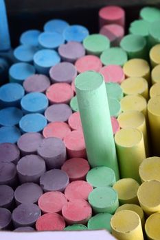 chalks in a variety of colors close up, shallow dof
