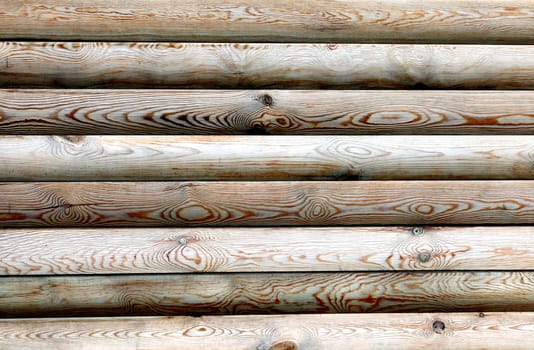 The wooden logs texture with natural patterns