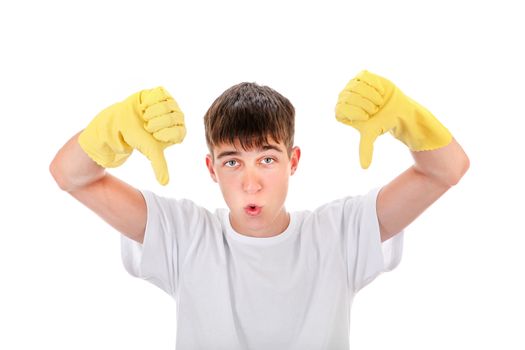 Young man in Rubber Gloves shows Thumbs Down Gesture Isolated On The White Background