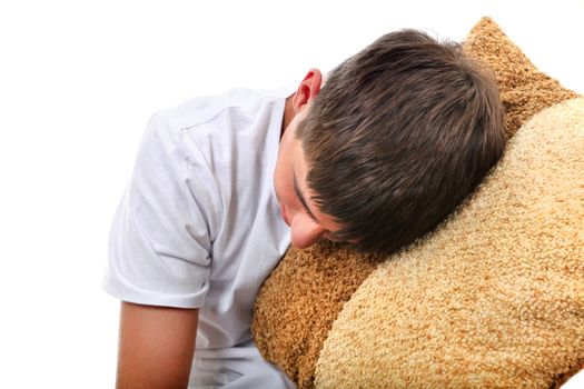 Teenager sleeps with Cushion Isolated On The White Background