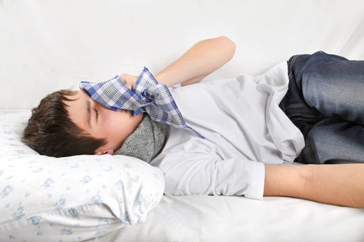 Young Man fell ill and Lying on the Bed with Handkerchief